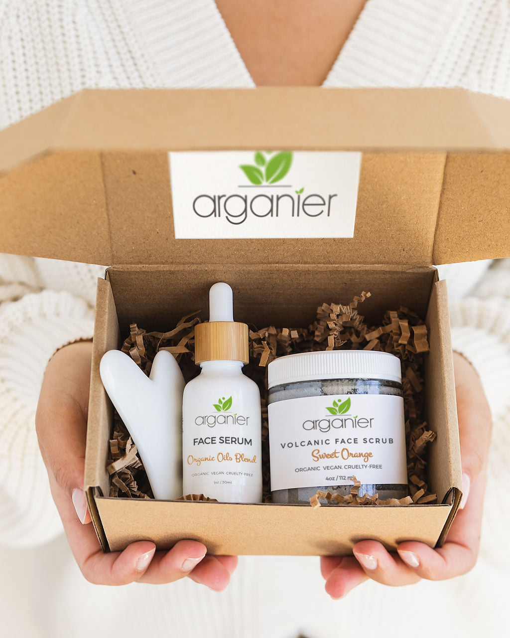 Natural organic skincare kit with face scrub, serum, clay mask and gua sha
