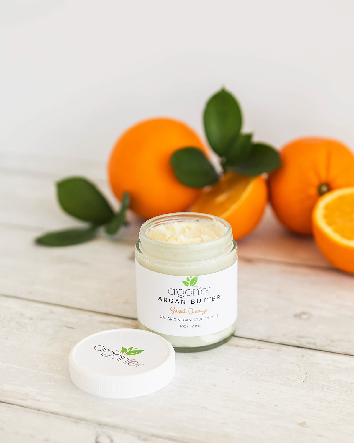 Whipped argan oil body butter in glass jar by Arganier - organic moisturizer for dry skin